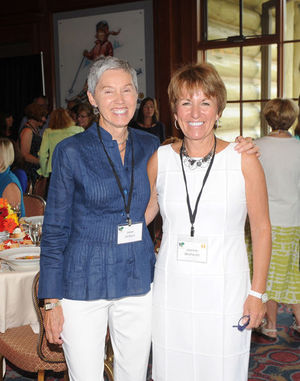 OUTGOING PRESIDENT JANET DEBARD, LEFT GREETS NEW PRESIDENT JOANNE WETHERALL BEFORE THE GRANT DISTRIBUTION